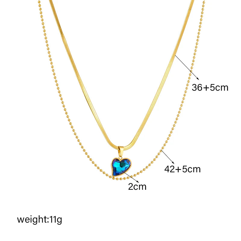 Collier en acier inoxydable avec cœur géométrique et cristaux colorés pour femme